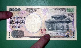 New 2,000-yen banknotes include 9,000 misprinted ones